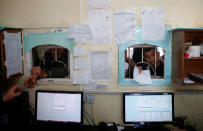 <p>Palestinian patients present their documents as they wait to receive treatment at an outpatient clinic at Shifa hospital, Gaza’s largest public medical facility, in Gaza City, March 29, 2017. (Photo: Mohammed Salem/Reuters) </p>