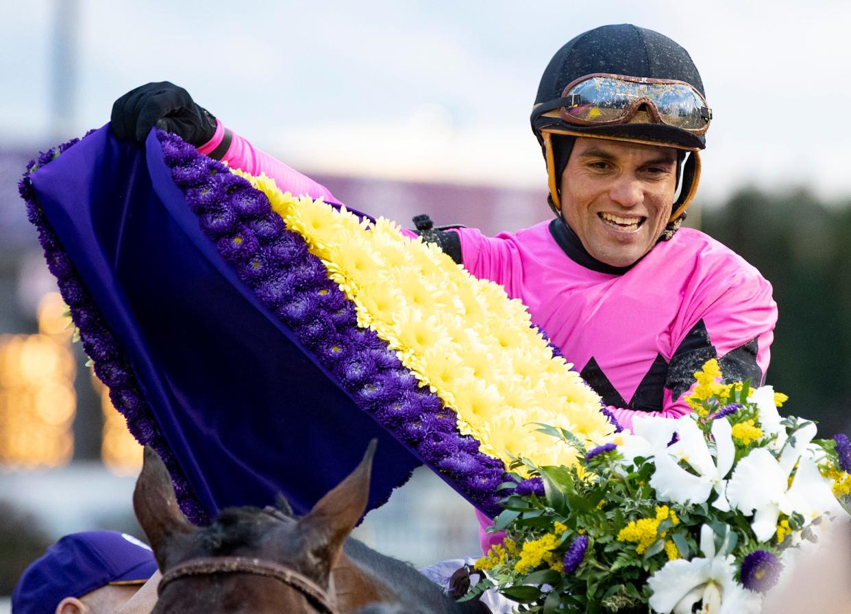 Jockey Joel Rosario celebrates after winning the Sentient Jet Breeders’ Cup Juvenile on Game Winner on Friday evening at Churchill Downs. Nov. 2, 2018