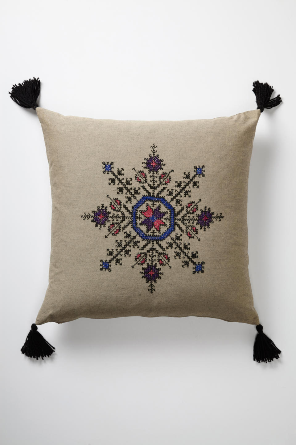 In this undated publicity photo released by Anthropologie.com, a Fesi pillow features a Moroccan design that echoes Scandinavian snowflake motifs. Pillows are a quick and easy way to introduce Scandinavian design elements. (AP Photo/Anthropologie.com)