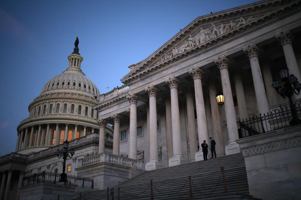 Sen. Ted Cruz (L) (R-TX) and special assistant Gray Harker depart the U.S. Capitol at dawn after an overnight session of the U.S. Senate on August 11, 2021 in Washington, DC. The Senate voted on a series of amendments known as a "vote-a-rama" overnight prior to final passage of a $3.5 trillion budget resolution that would expand Medicaid, provide free community college and preschool, and fund efforts to combat climate change.