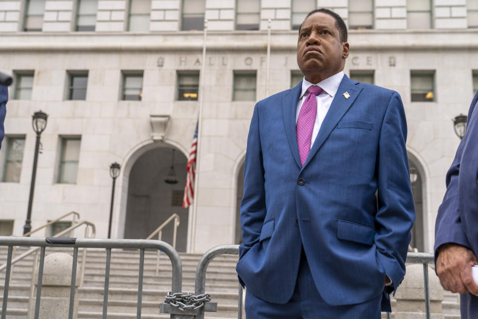 FILE - In this Sept. 2, 2021, file photo, is gubernatorial candidate and radio talk show host Larry Elder during a campaign stop outside the Hall of Justice downtown Los Angeles. In two short months, Larry Elder emerged from the province of conservative talk radio to dominate the Republican field in the California recall election that could remove Democratic Gov. Gavin Newsom from office, drawing national headlines, attracting fervent crowds to his rallies and quickly banking millions of dollars for his first campaign. (AP Photo/Damian Dovarganes, File)