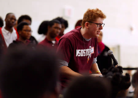 FILE PHOTO: Matt Deitsch, an alumni of Marjory Stoneman Douglas High School, speaks during a rally with Thurgood Marshall Academy students in advance of Saturday's March for Our Lives event in Washington, U.S. March 22, 2018. REUTERS/Eric Thayer/File Photo