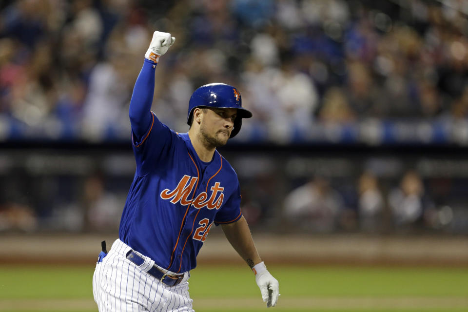 New York Mets' J.D. Davis celebrates after hitting a two-run home run during the fourth inning of a baseball game against the Atlanta Braves on Friday, Sept. 27, 2019, in New York. (AP Photo/Adam Hunger)