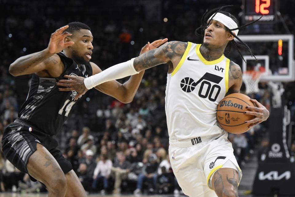 Utah Jazz’s Jordan Clarkson (00) drives against San Antonio Spurs’ Blake Wesley during the second half of an NBA basketball game, Tuesday, Dec. 26, 2023, in San Antonio. Utah won 130-118. | Darren Abate, Associated Press