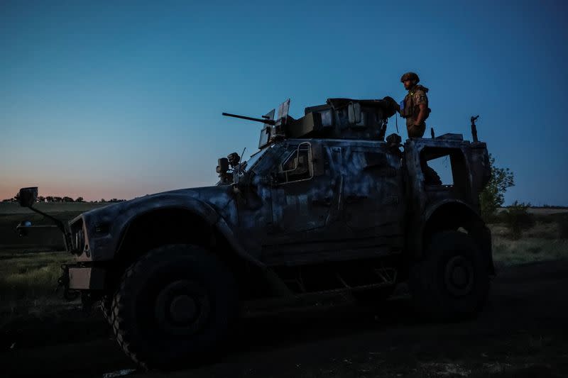 Ukrainian service members attend military drills near a frontline in Donetsk region