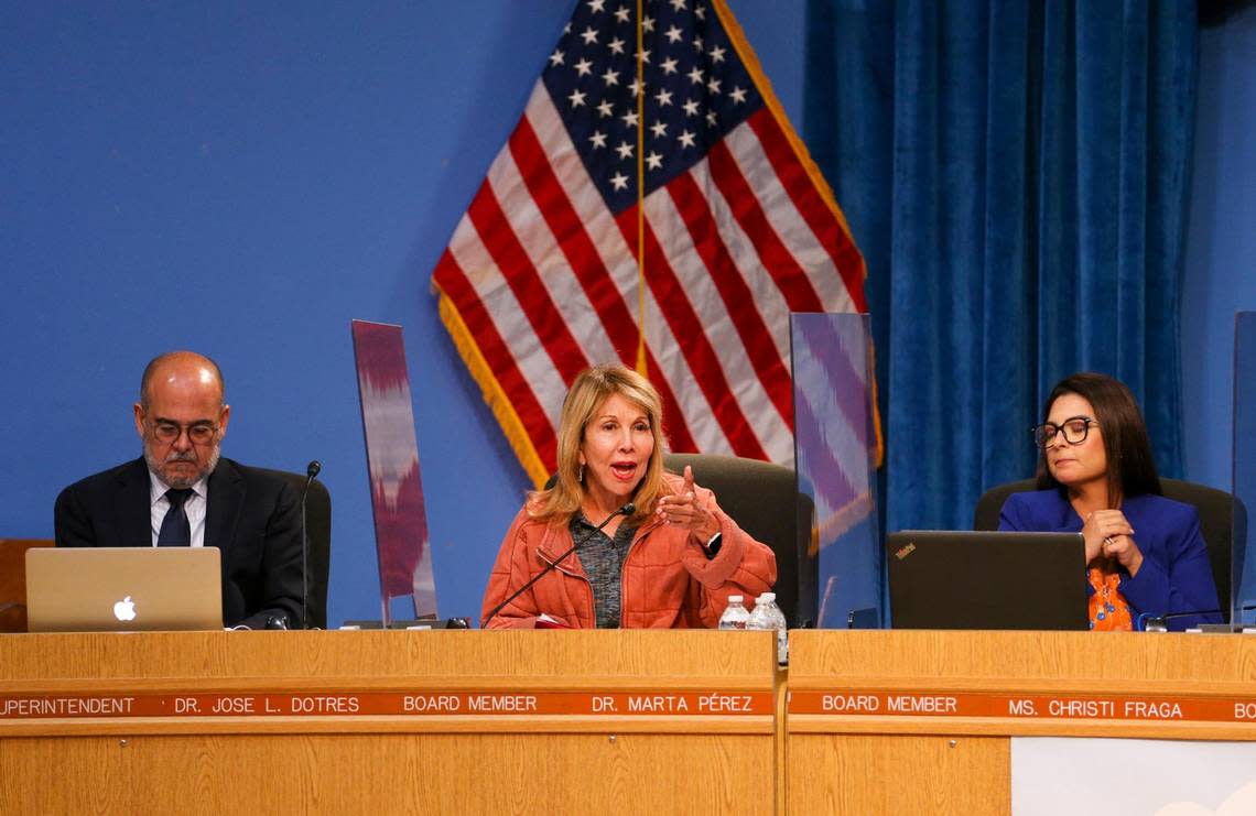 Miami-Dade County School Board Member Dr. Marta Pérez, center, discusses the implications of last week vote to reject the adoption of a comprehensive health and sex-education textbook for middle and high school students during a special meeting at the Miami-Dade County Public Schools building in downtown Miami, Thursday, July 28, 2022.