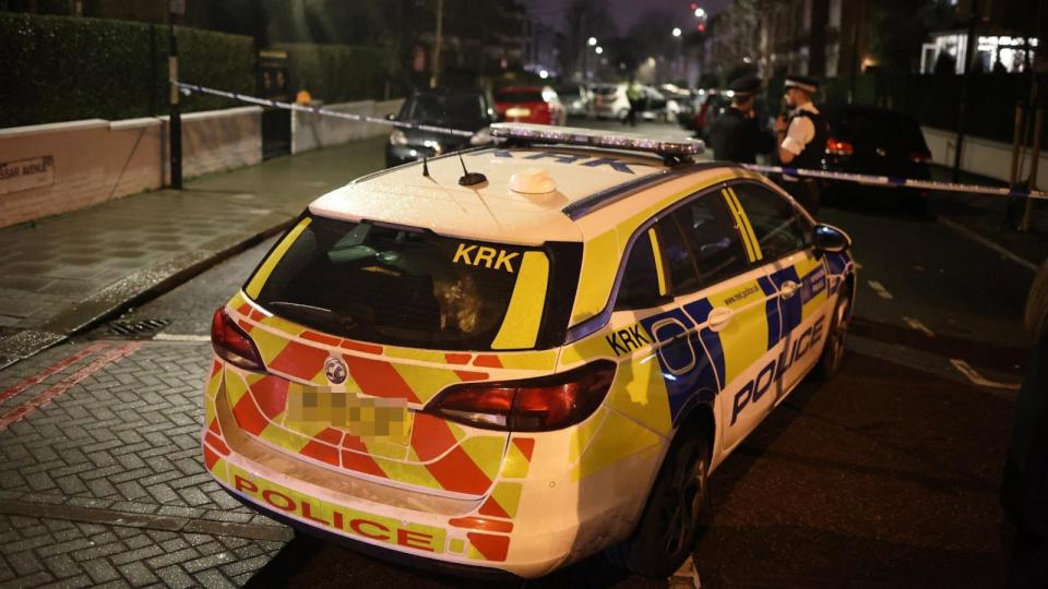 PHOTO: Police guard the area after nine people were hurt when a suspected corrosive substance was thrown at them in Clapham, south London, Jan. 31, 2024. (Marcin Nowak/LNP via Shutterstock)
