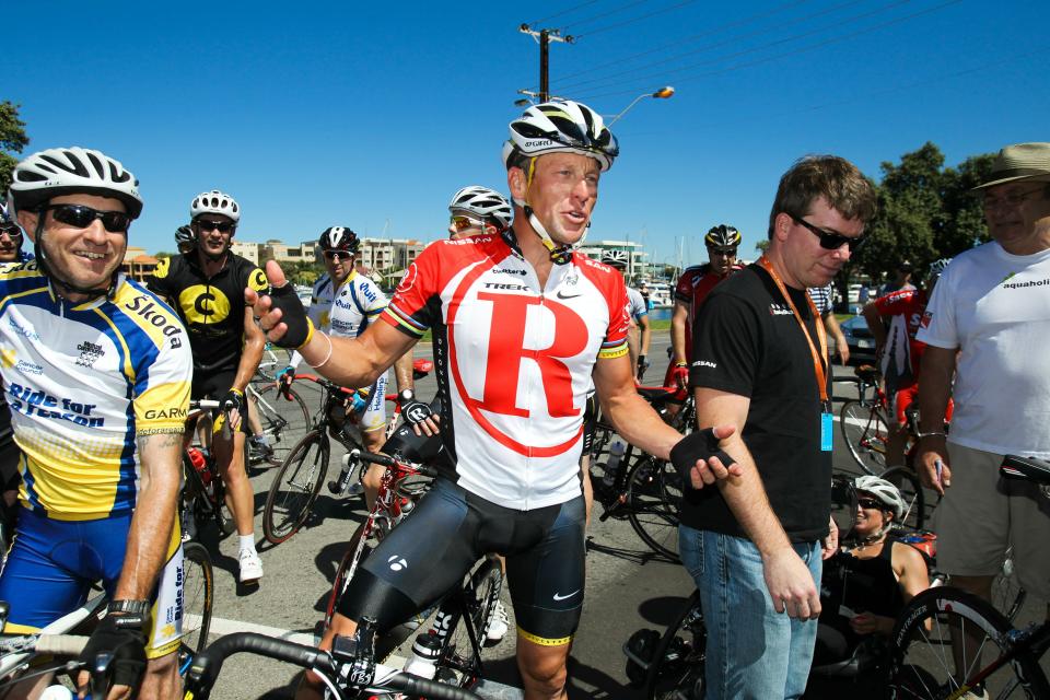 Lance Armstrong of the US (C) is interviewed in prepartation for the upcoming Tour Down Under cycling event in Adelaide on 15 January 2011. The Tour Down Under cycling event will be held from January 16-23. IMAGE STRICTLY RESTRICTED TO EDITORIAL USE STRICTLY NO COMMERCIAL USE AFP PHOTO / MARK GUNTER (Photo credit should read Mark Gunter/AFP/Getty Images)