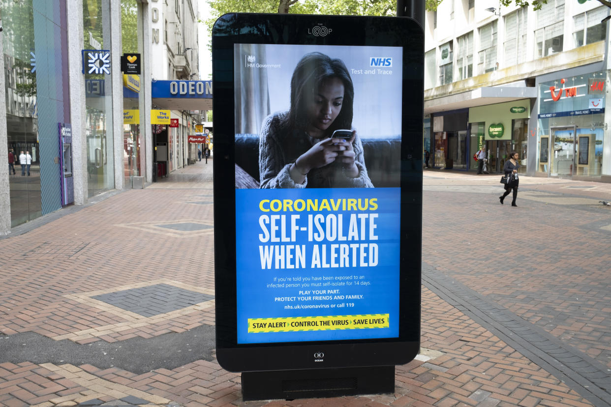 HM Government, Public Health England, NHS advertising boards test and trace advice to self isolate for 14 days if alerted as the Coronavirus lockdown measures continue, albeit in a relaxed form, the city centre is still very quiet while more people are returning, the quiet city may be coming to an end as businesses are set to start to reopen soon on 2nd June 2020 in Birmingham, England, United Kingdom. Coronavirus or Covid-19 is a respiratory illness that has not previously been seen in humans. While much or Europe has been placed into lockdown, the UK government has put in place more stringent rules as part of their long term strategy, and in particular 'social distancing'. (photo by Mike Kemp/In PIctures via Getty Images)