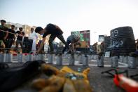 Iraqis march in Najaf on the anniversary of the anti-government protests