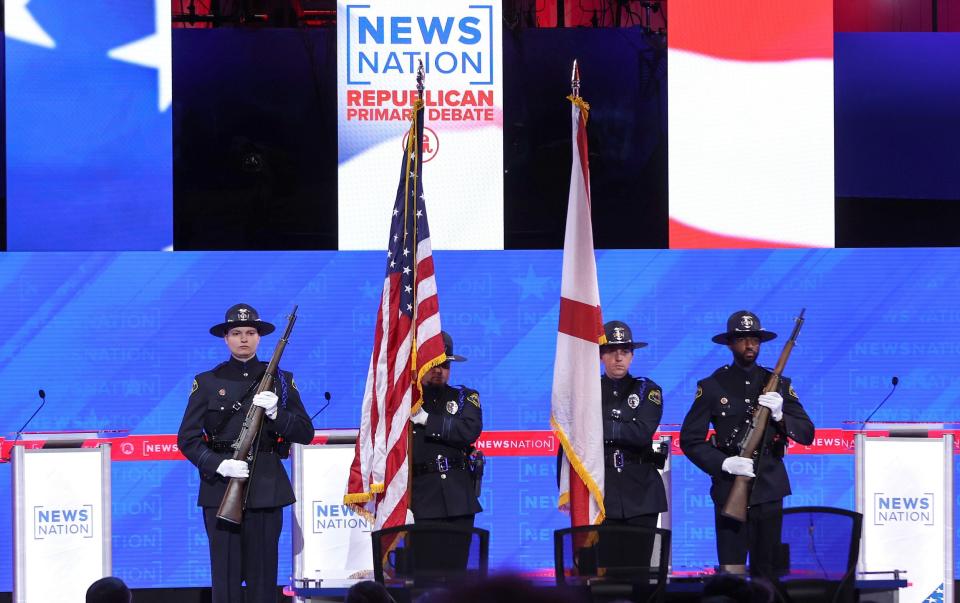 A police honour guard ahead of the start of the debate