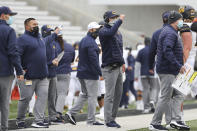 California head coach Justin Wilcox, center, signals to players during the first half of an NCAA college football game against Oregon State in Corvallis, Ore., Saturday, Nov. 21, 2020. (AP Photo/Amanda Loman)