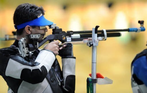 India's Abhinav Bindra competes in the men's 10m air rifle event at the 2010 Commonwealth Games in New Delhi. Bindra is India's main medal hope in the forthcoming London Olympics