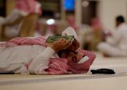 <p>A man rests as he reads the Quran in a mosque during Ramadan in Riyadh, Saudi Arabia, May 29, 2017. (Faisal Al Nasser/Reuters) </p>