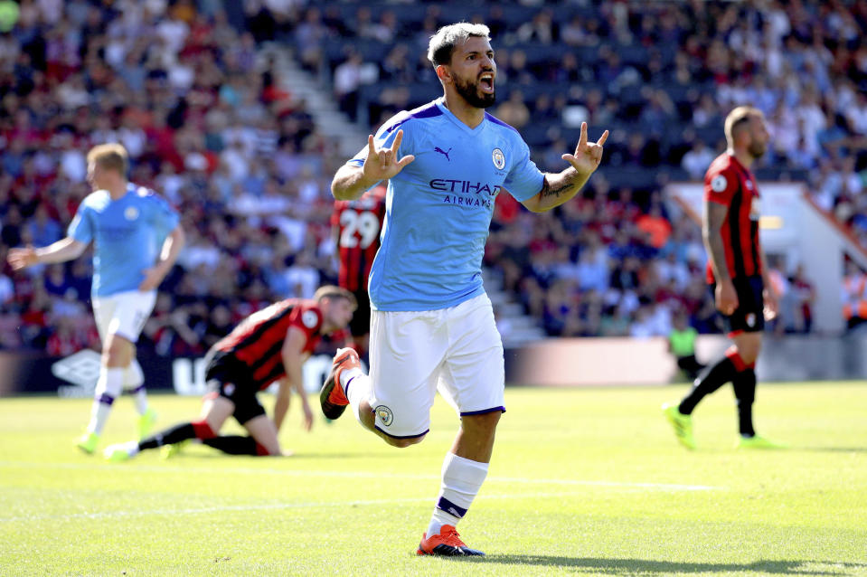 Manchester City's Sergio Aguero celebrates scoring his side's third goal of the game during the English Premier League soccer match between Bournemouth and Manchester City at the Vitality Stadium, Bournemouth, England, Sunday Aug. 25, 2019. (Adam Davy/PA via AP)