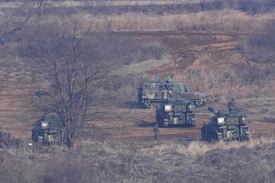 South Korean army K-55 self-propelled howitzers take positions in Paju, South Korea, near the border with North Korea, Wednesday, Jan. 11, 2023. North Korea's spike in missile tests, growing nuclear ambitions and other provocative acts pose a "serious threat" that could lead to a dangerous miscalculation and spark a wider conflict, South Korean President Yoon Suk Yeol said Tuesday. (AP Photo/Ahn Young-joon)