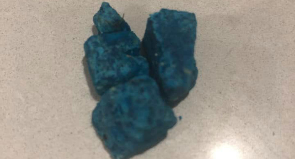 A picture of a three purple clumps. A Moss Vale woman claims she found her dog chewing on these lumps recently which is believed to be rat poison. It's not known if someone tried to deliberately poison her dog.