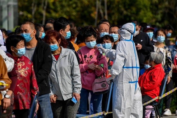 China has largely been successful in bringing infection rates down with mass testing and strict city-wide lockdowns (AFP via Getty Images)