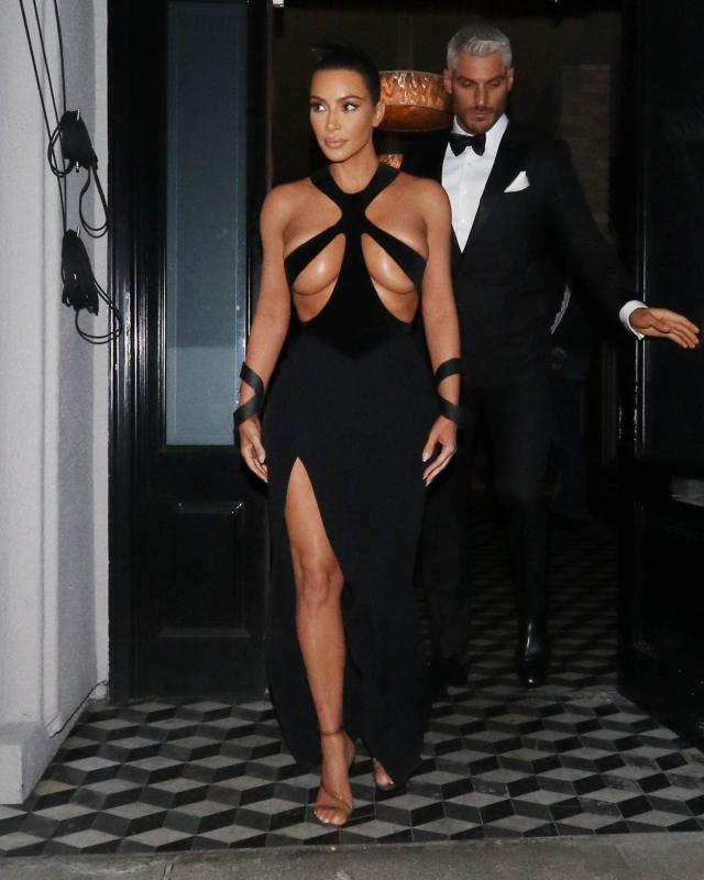 Kim Kardashian Covers Time Magazine in Body-con Black Bodysuit – WWD