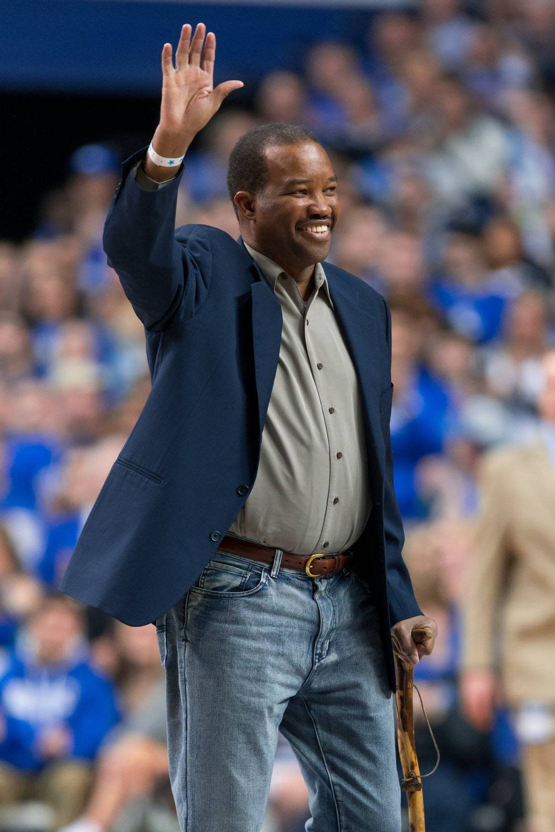 Reggie Warford, who was an assistant coach at Pittsburgh, Iowa State and Long Beach State after his playing days at Kentucky, waves to the Rupp Arena crowd during a UK game in 2016.