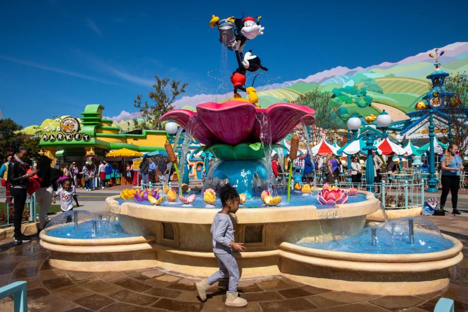 The New CenTOONial Park Fountain at Disneyland's Toontown features Mickey and Minnie figures