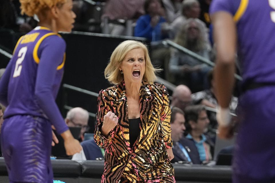 LSU head coach Kim Mulkey reacts during the first half of the NCAA Women's Final Four championship basketball game against Iowa Sunday, April 2, 2023, in Dallas. (AP Photo/Darron Cummings)