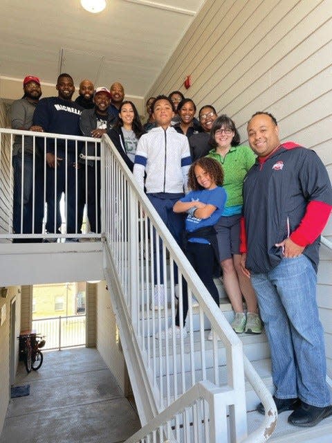 United Ministries works with nearly 200 community partners, including faith communities, corporations and service entities. Here, volunteers from Michelin’s African American Network help set up 10 emergency shelter apartments, which UM has leased in partnership with Front Porch Housing.