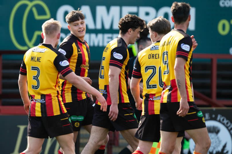 Thistle players celebrate their emphatic win