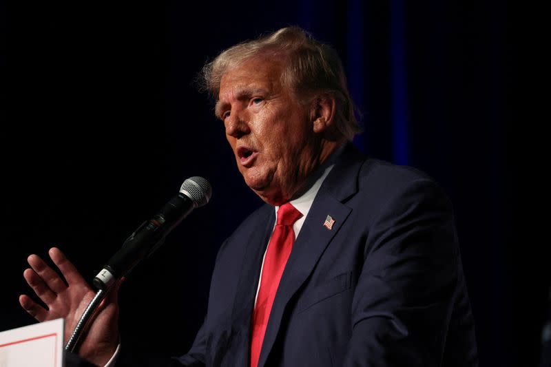 FILE PHOTO: Former U.S. President and Republican presidential candidate Trump meets with supporters in West Palm Beach