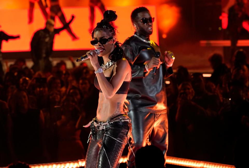 Teyana Taylor (left) and Sean "Diddy" Combs kicked off the show.