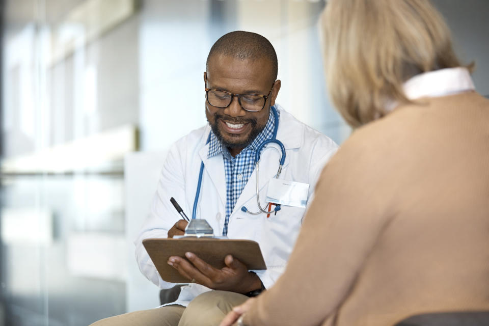 a doctor talking with a patient