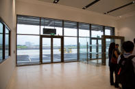 <p>Arriving passengers will enter Seletar Airport’s new passenger terminal through these doors. (PHOTO: Yahoo News Singapore / Dhany Osman) </p>