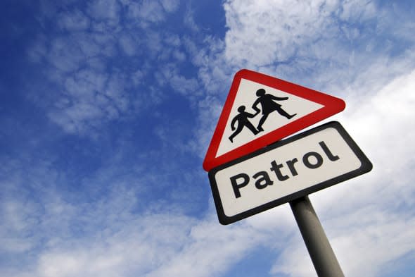 School children crossing sign with copy space