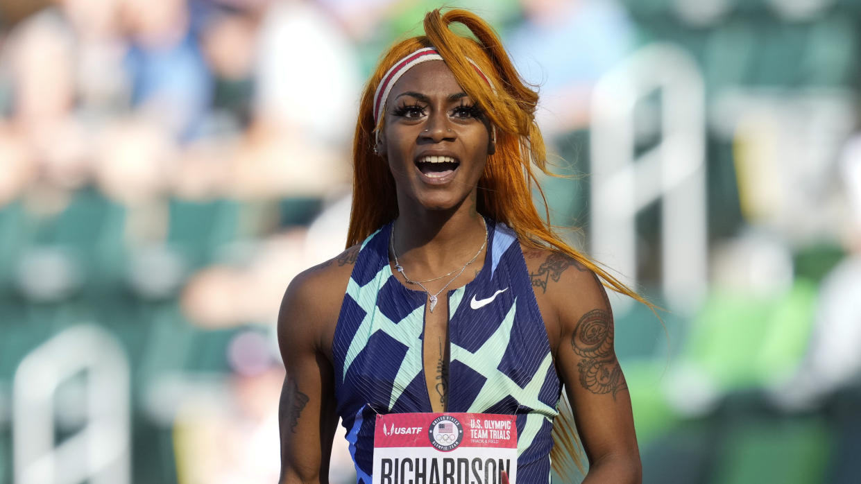 Sha'Carri Richardson celebrates after winning the first heat of the semis finals in women's 100-meter runat the U.S. Olympic Track and Field Trials Saturday, June 19, 2021, in Eugene, Ore. (AP Photo/Ashley Landis)