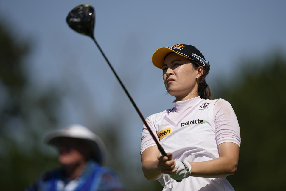 In Gee Chun, of South Korea, watches her tee shot on the eighth hole during the third round of the Chevron Championship women's golf tournament at The Club at Carlton Woods on Saturday, April 22, 2023, in The Woodlands, Texas. (AP Photo/Eric Gay)