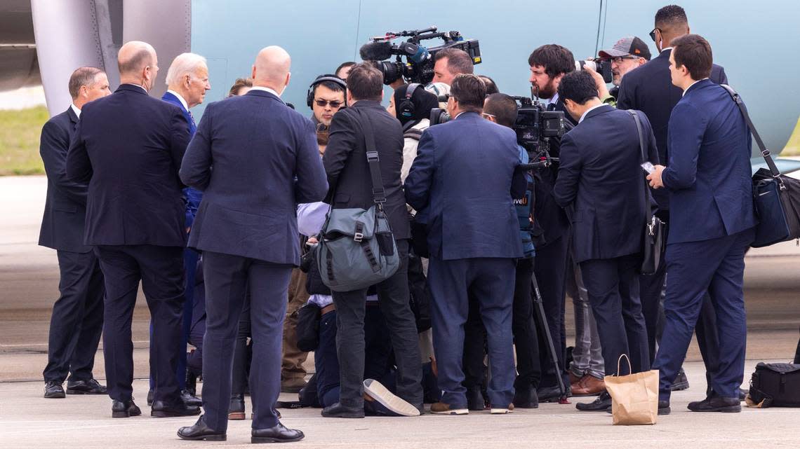 President Joe Biden speaks with members of the White House Press Corp before boarding Air Force One from RDU International Airport Tuesday, March 28, 2023. Biden visited Wolfspeed in Durham Tuesday to tout his national economic agenda.