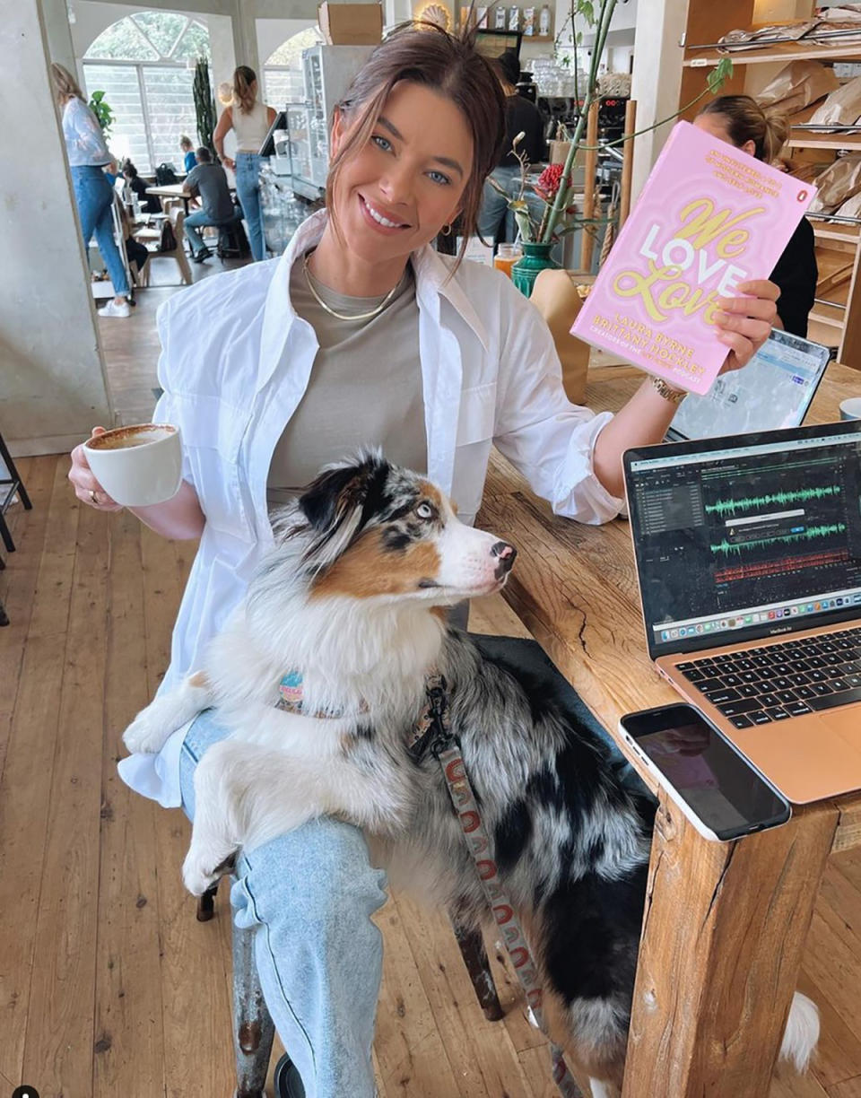 Brittney Hockley with dog and book