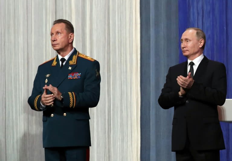 A close ally of Russian President Vladimir Putin (R), National Guard chief Viktor Zolotov (L) has created a video message blasting Kremlin critic and jailed opposition leader Alexei Navalny, who has accused him of corruption