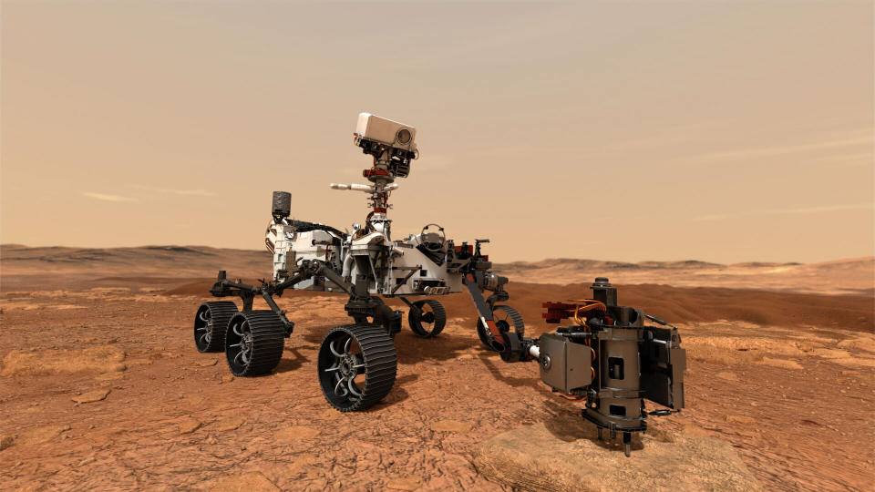 A concept illustration provided by NASA shows the Perseverance rover using its drill to core a rock sample from Mars. These samples will then be stored in sealed tubes on the planet's surface for future missions to retrieve. (Photo: NASA via Getty Images)