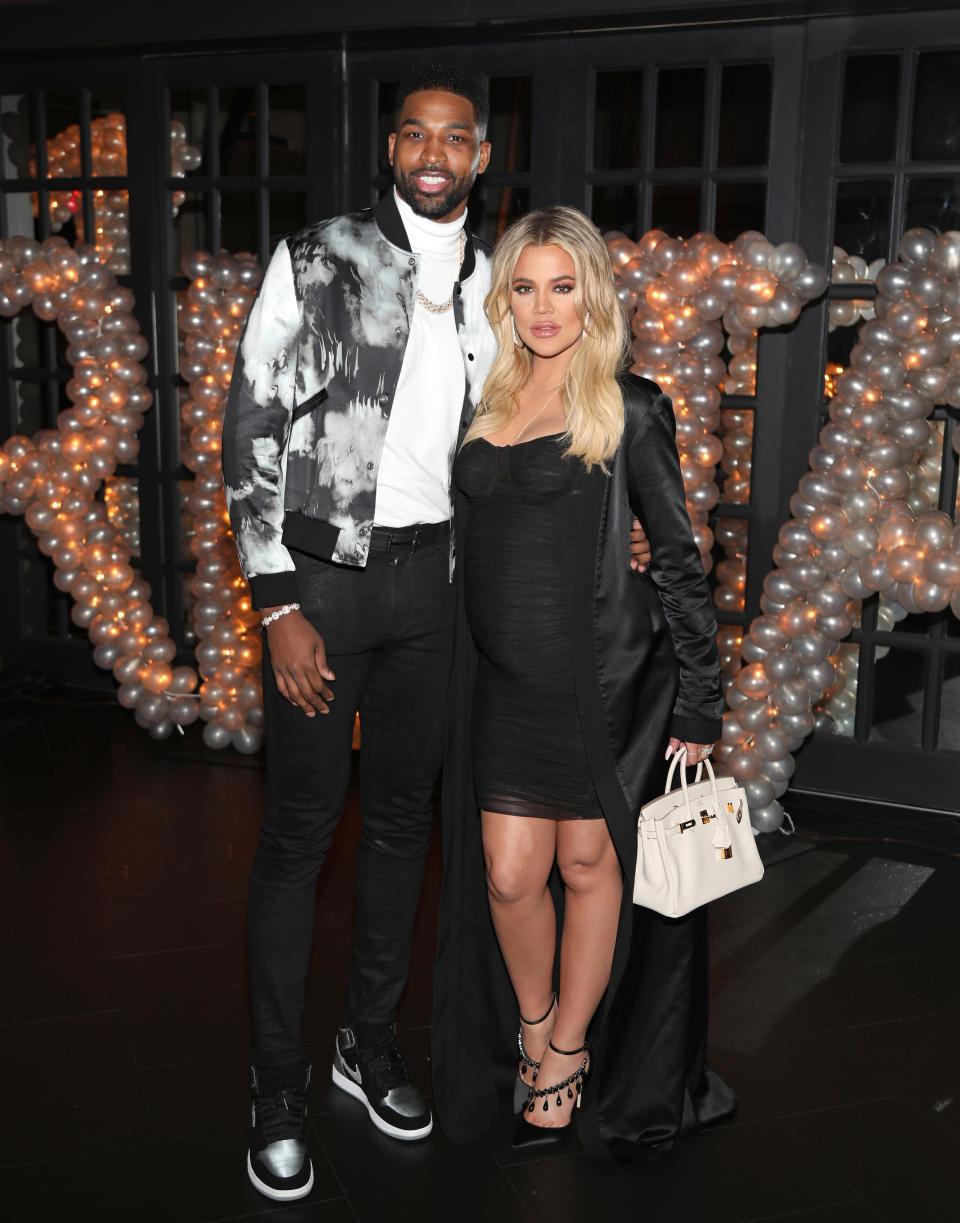 Tristan Thompson and Khloe Kardashian pose at Tristan Thompson's Birthday at Beauty & Essex in March 2018