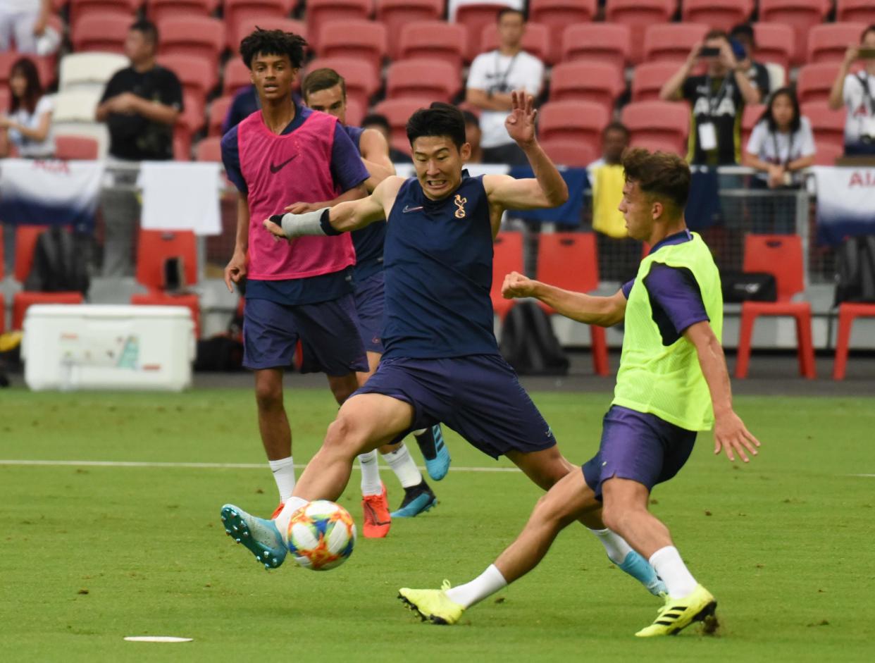 Tottenham Hotspur's South Korea forward Son Heung-min tussles for the ball during training at National Stadium for the International Champions Cup. (PHOTO: Zainal Yahya/Yahoo News Singapore)