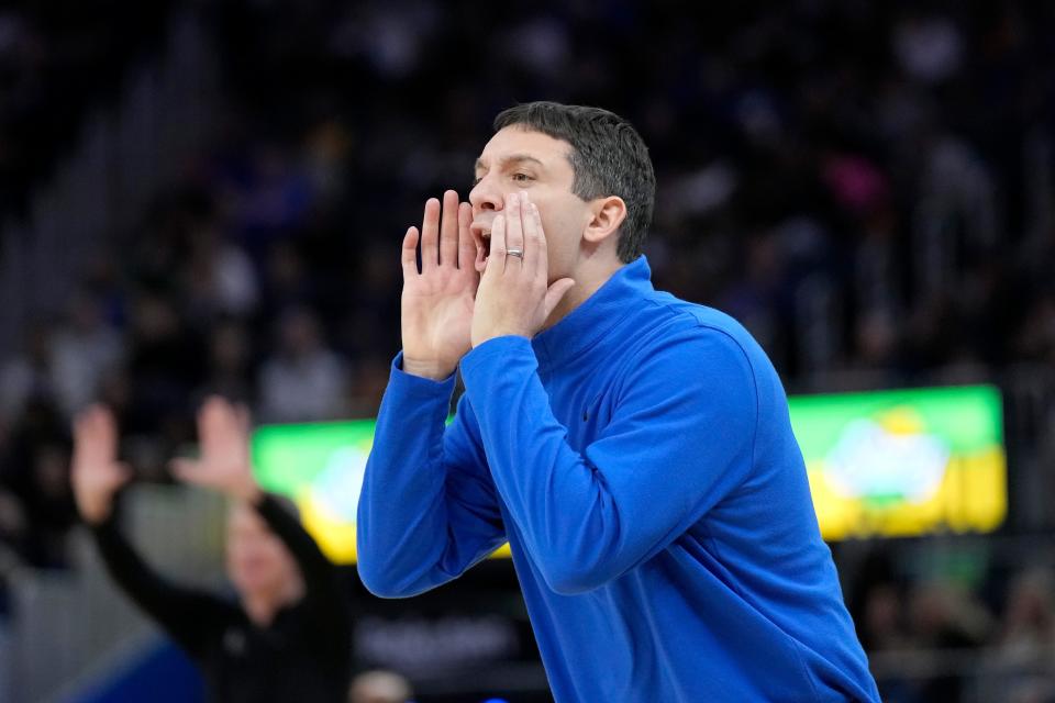 Oklahoma City Thunder coach Mark Daigneault yells to players during the second half of the team's NBA basketball game against the Golden State Warriors in San Francisco, Tuesday, April 4, 2023.