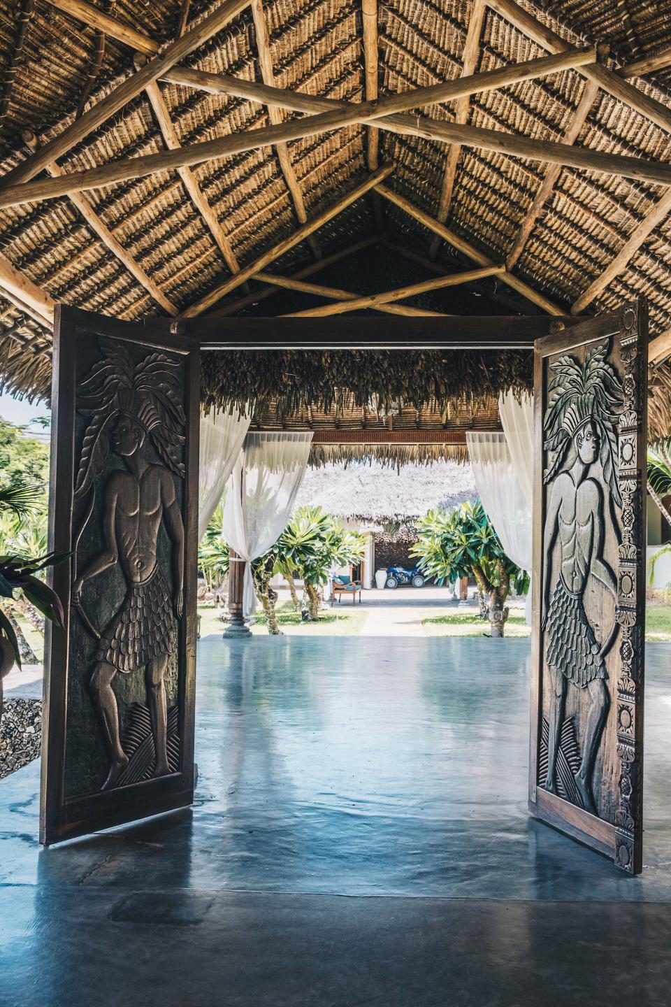 A pair of doors carved by Armando Tanzini open onto a welcoming terrace.