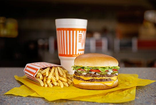 The Double Meat Whataburger with Cheese along with a Peach shake, french fries Whatameal is popular at Whataburger, which recently opened its newest Jacksonville restaurant at at 10600 San Jose Blvd.