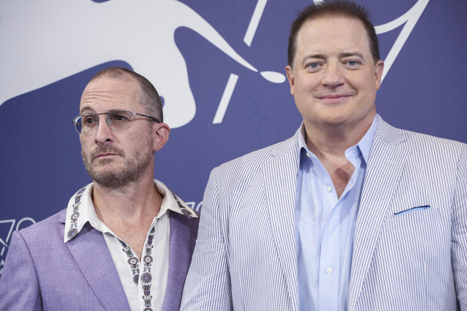 Director Darren Aronofsky, left, and Brendan Fraser pose for photographers at the photo call for the film 'The Whale' during the 79th edition of the Venice Film Festival in Venice, Italy, Sunday, Sept. 4, 2022. (Photo by Joel C Ryan/Invision/AP)