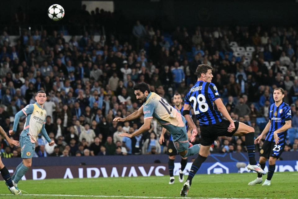 Ilkay Gundogan could have won the game late on but headed over the crossbar (AFP via Getty Images)