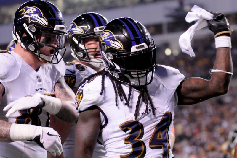 Former NFL running back Alex Collins (34) totaled a career-high 1,160 yards from scrimmage in 15 games in 2017 for the Baltimore Ravens. File Photo by Archie Carpenter/UPI