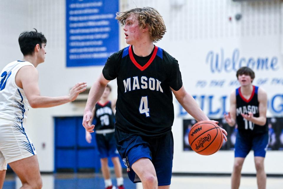 Mason's Kaleb Parrish moves the ball against Ionia during the fourth quarter on Tuesday, Jan. 24, 2023, at Ionia High School.