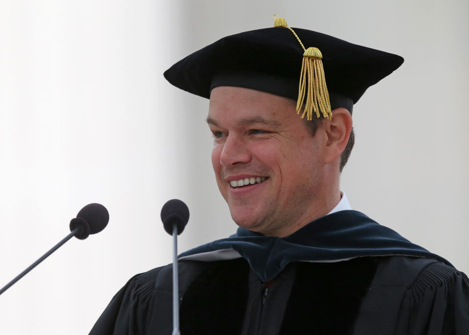 Closeup of Matt Damon at a commencement ceremonu