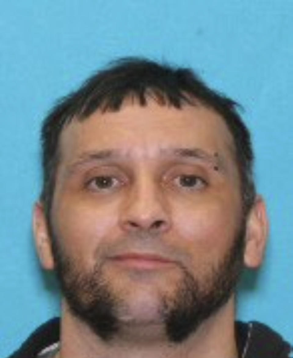 This drivers license photo released in an FBI affidavit shows alleged suspect Marc Muffley, who was arrested Monday, Feb. 27, 2023, after an explosive was found in a bag checked onto a Florida-bound flight at Lehigh Valley International Airport in Allentown, Pa., federal authorities said. (FBI via AP)